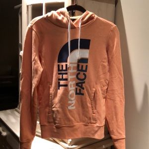 Peachy colored North Face Sweatshirt